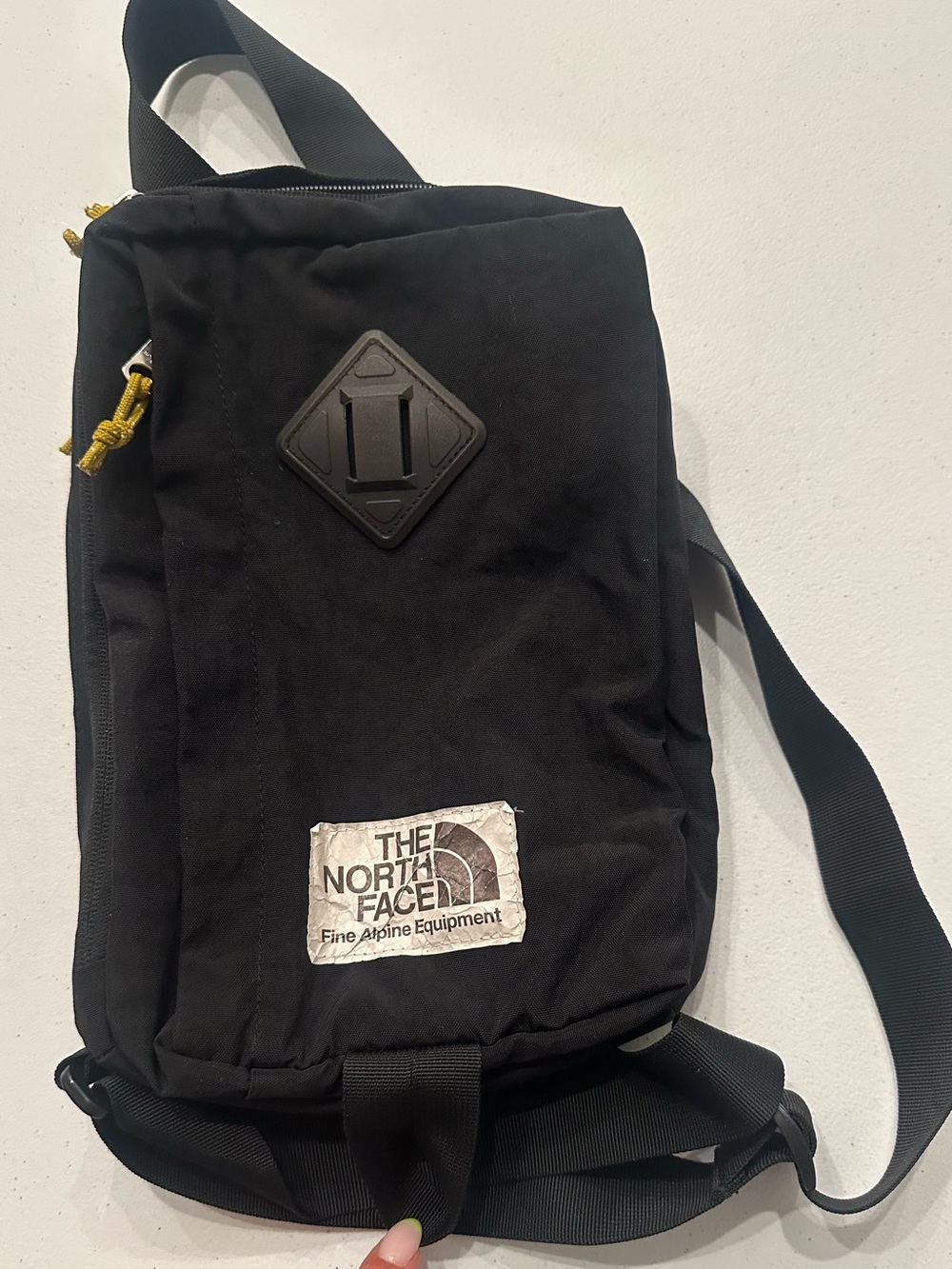 The North Face Belt/Sling Bag with Yellow Pulls